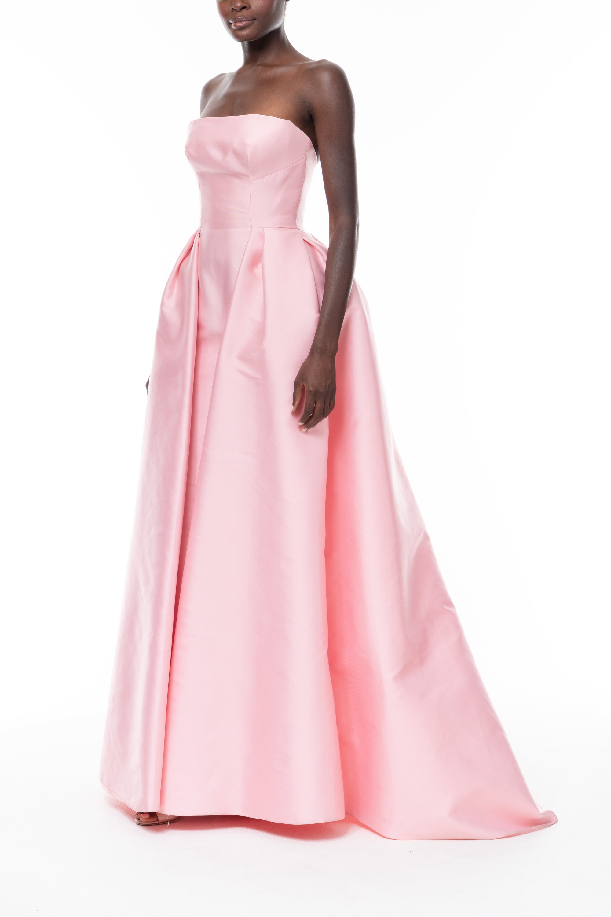 Monique Lhuillier Spring 2026 Carnation Mikado Strapless ball gown with pleated skirt - side.