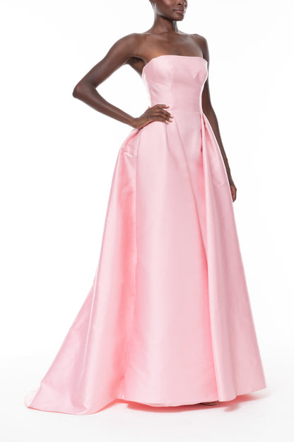 Monique Lhuillier Spring 2026 Carnation Mikado Strapless ball gown with pleated skirt -  side.
