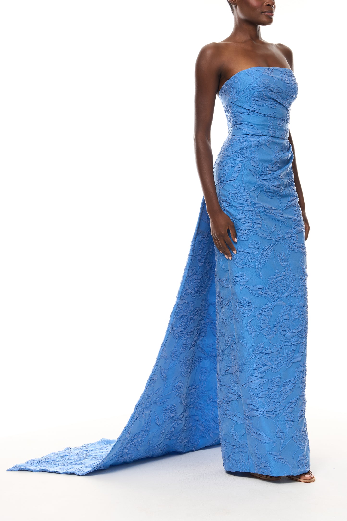 Monique Lhuillier Spring 2026 Lake Botanical Matelassé Draped front column
gown with train - side.