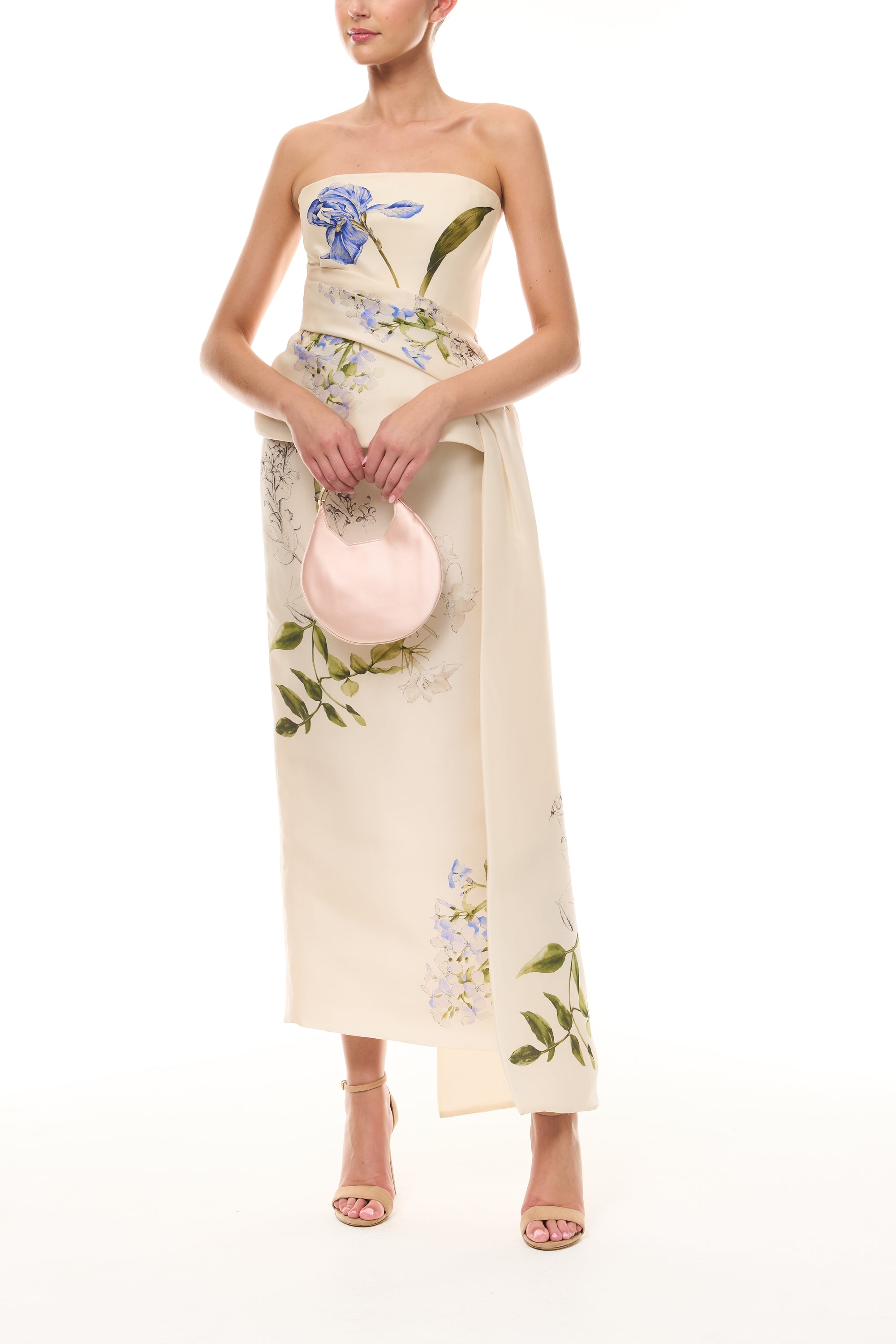Monique Lhuillier Spring 2026 Iris Bouquet
Printed Gazar Strapless draped peplum gown - front with Blush Demi Evening Bag.