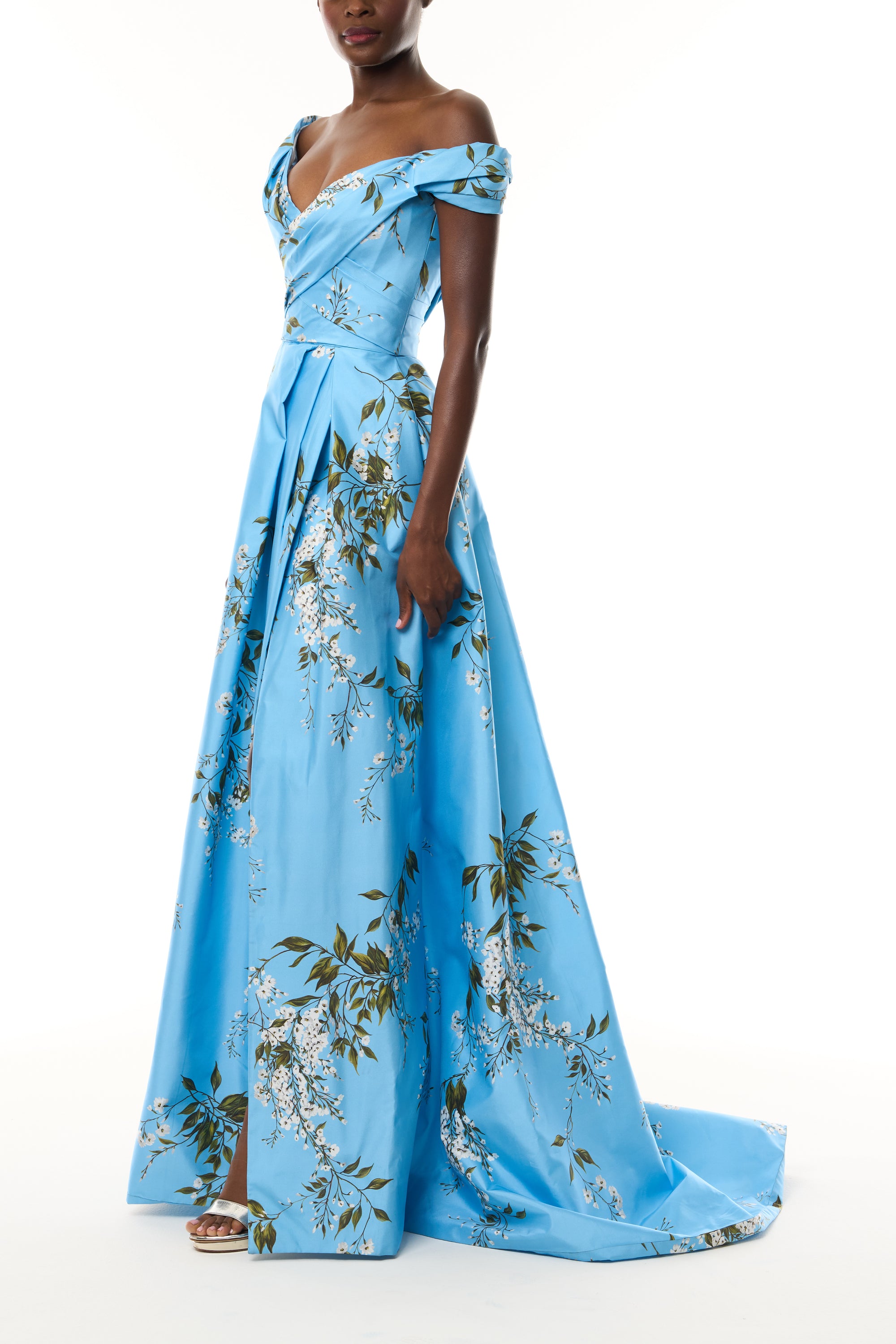 Monique Lhuillier Fall 2026 Horizon Blue Multi Wisteria Printed Taffeta Asymmetric draped bodice ball gown with front slit- side.