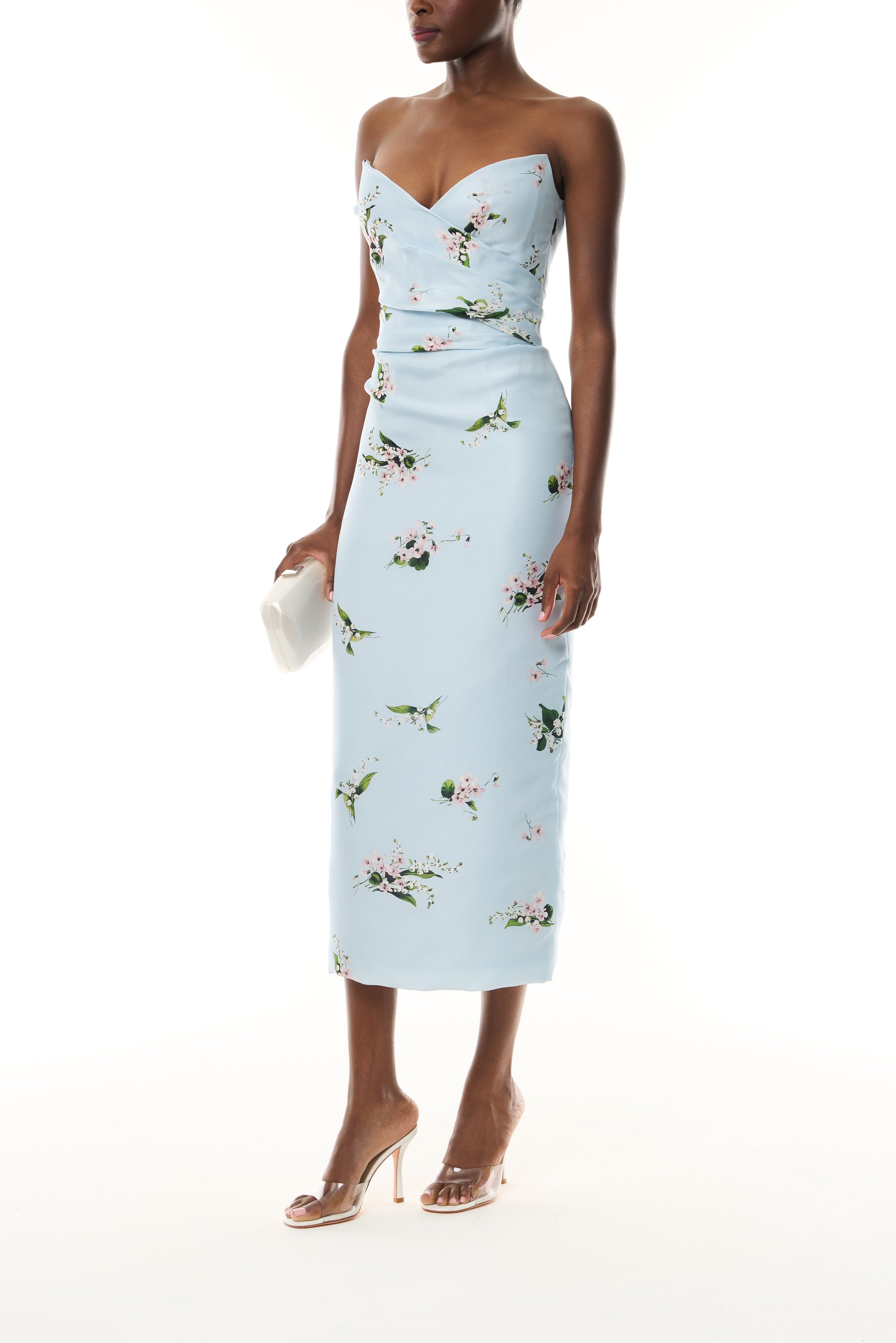 Monique Lhuillier Fall 2026 Breeze Multi Floating Posies Printed Gazar Strapless draped bodice cocktail dress - front with Crystal Dust Dasha Minaudière