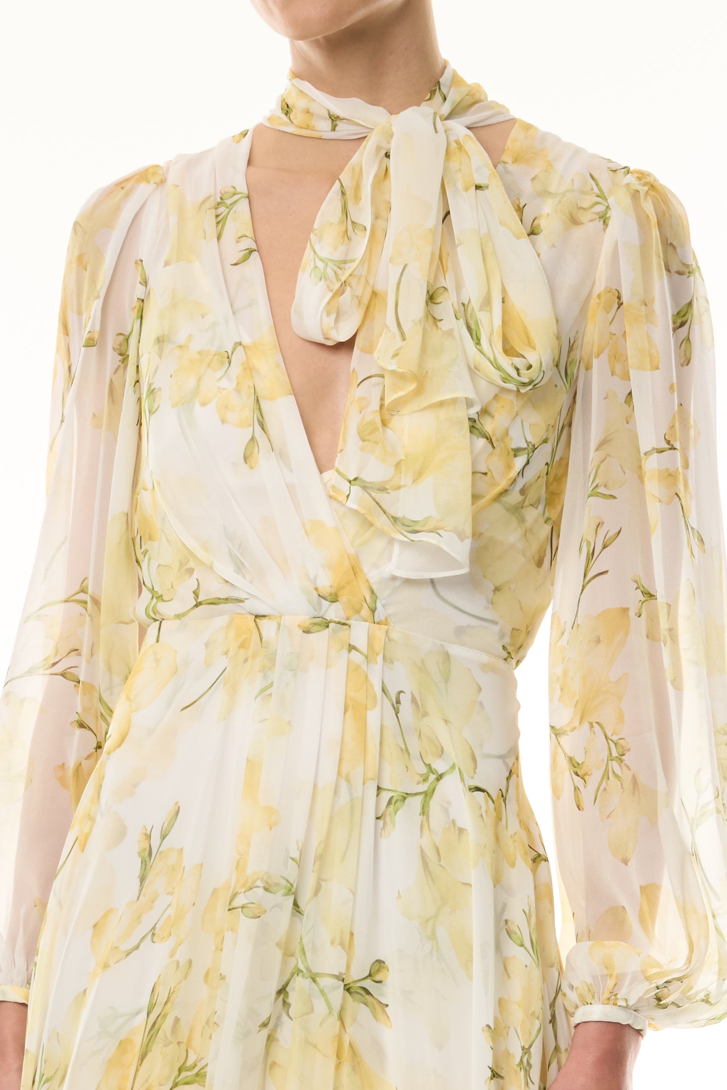 Monique Lhuillier Fall 2026 Pale Yellow/Multi Snapdragon Floral Printed Chiffon Draped V-neck long sleeve gown with blouson sleeves - fabric.