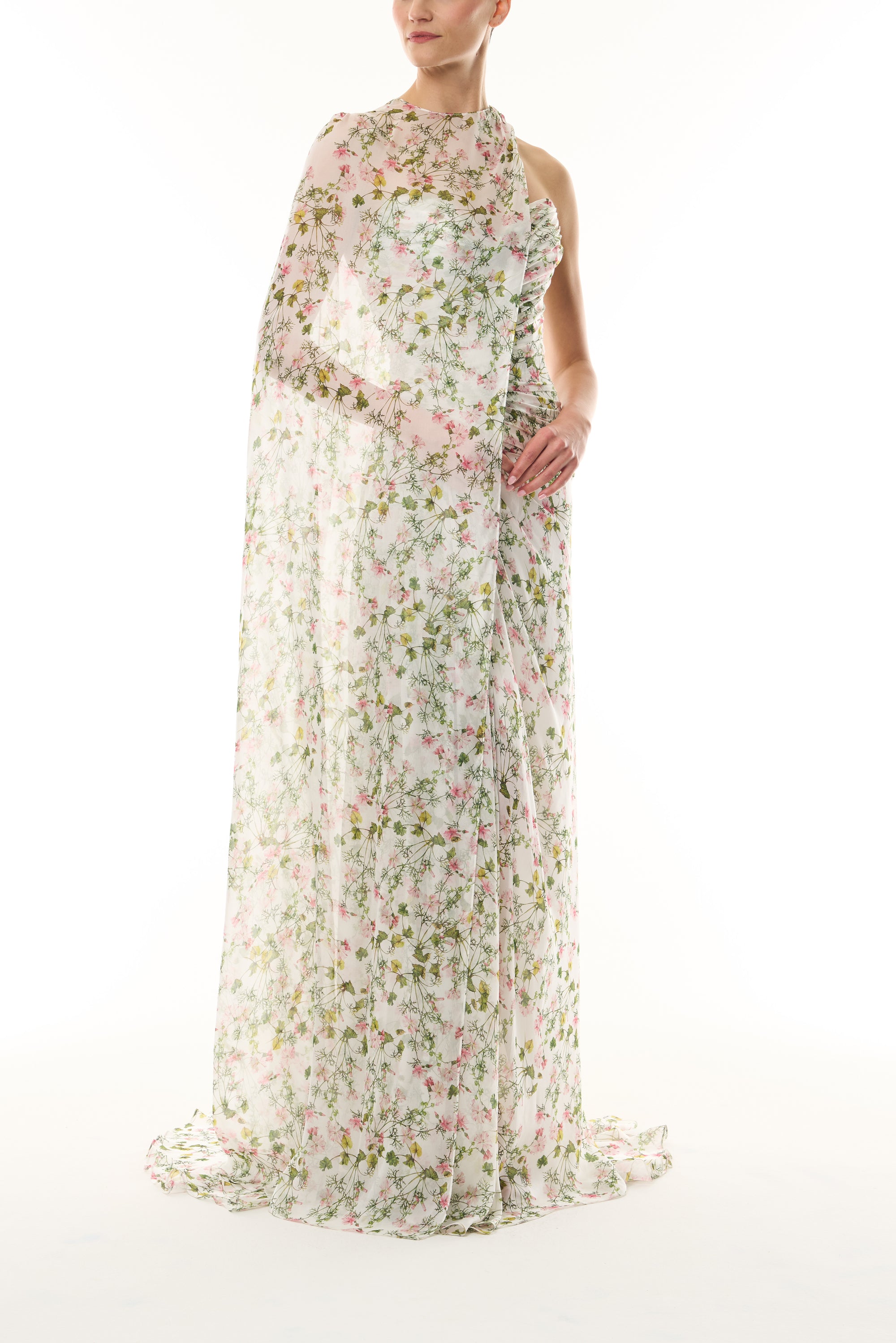 Monique Lhuillier Fall 2026 Silk White/Multi Ivy Bloom Printed Silk Chiffon asymmetric floor length cape with coordinating strapless floor length gown - side.