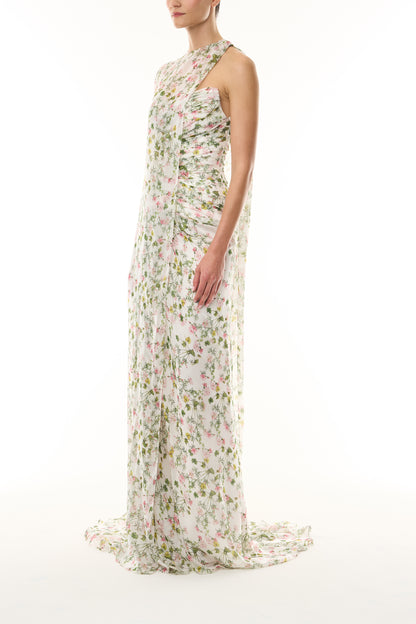 Monique Lhuillier Fall 2026 Silk White/Multi Ivy Bloom Printed Silk Chiffon asymmetric floor length cape with coordinating strapless floor length gown - side. 