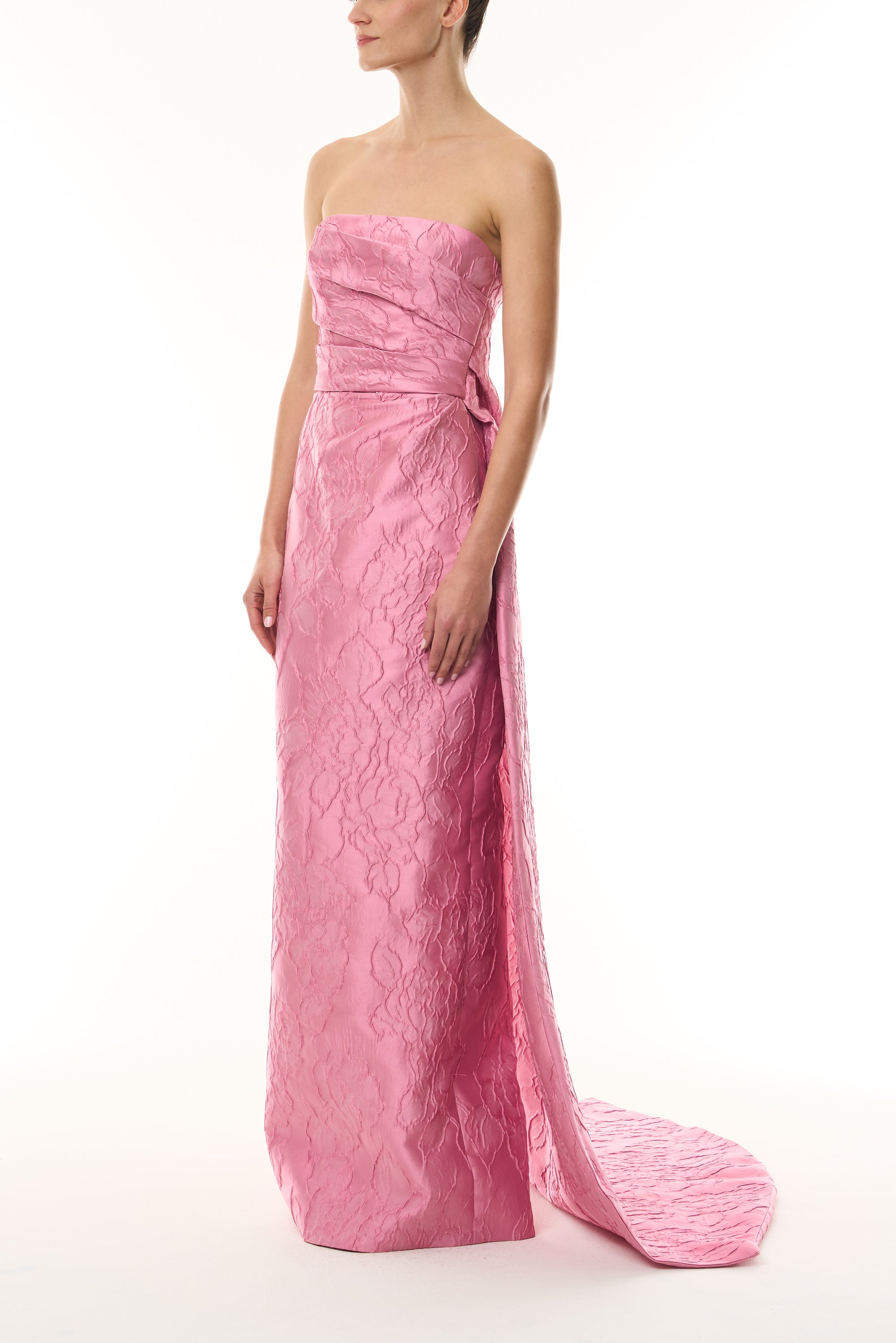 Monique Lhuillier Fall 2026 Sweetpea Jacquard strapless draped gown with train  - side.