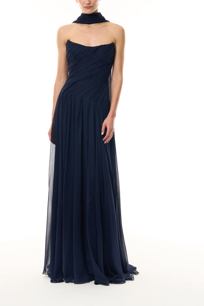 Monique Lhuillier Fall 2026 Navy chiffon strapless draped gown with scarf - front.