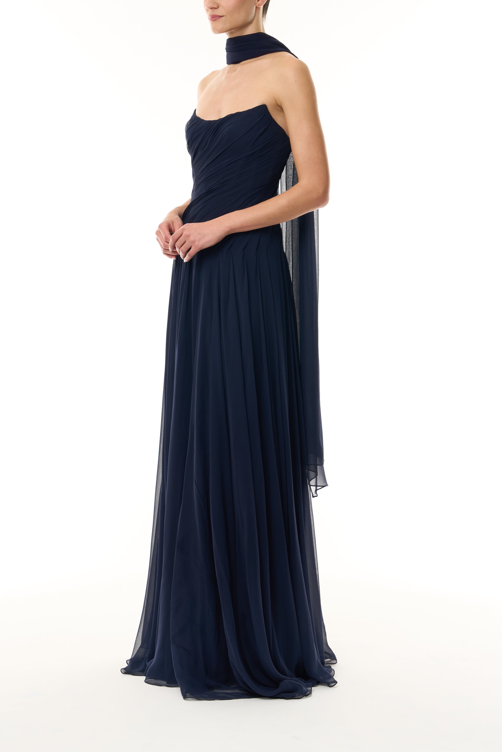 Monique Lhuillier Fall 2026 Navy chiffon strapless draped gown with scarf - side.