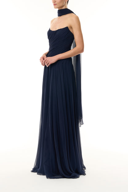 Monique Lhuillier Fall 2026 Navy chiffon strapless draped gown with scarf - side.