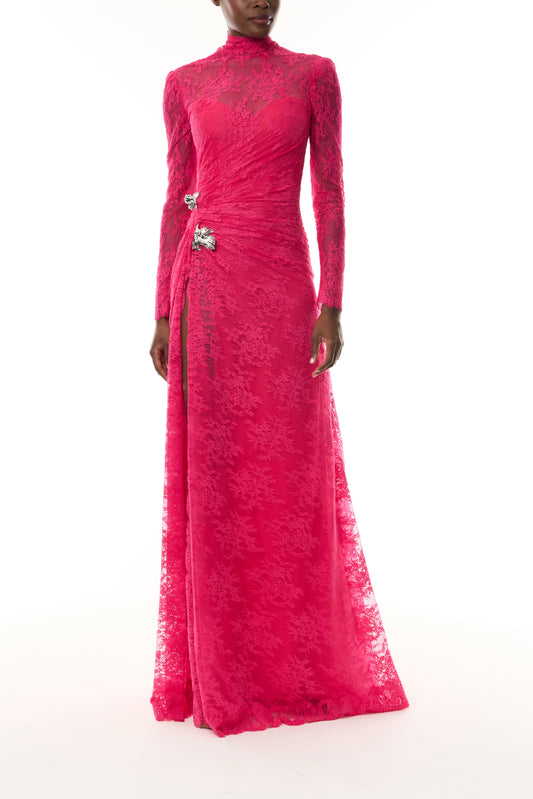 Monique Lhuillier Fall 2026 Pink Chantilly Lace high neck long sleeve gown with slit and silver floral embellishment - front. 