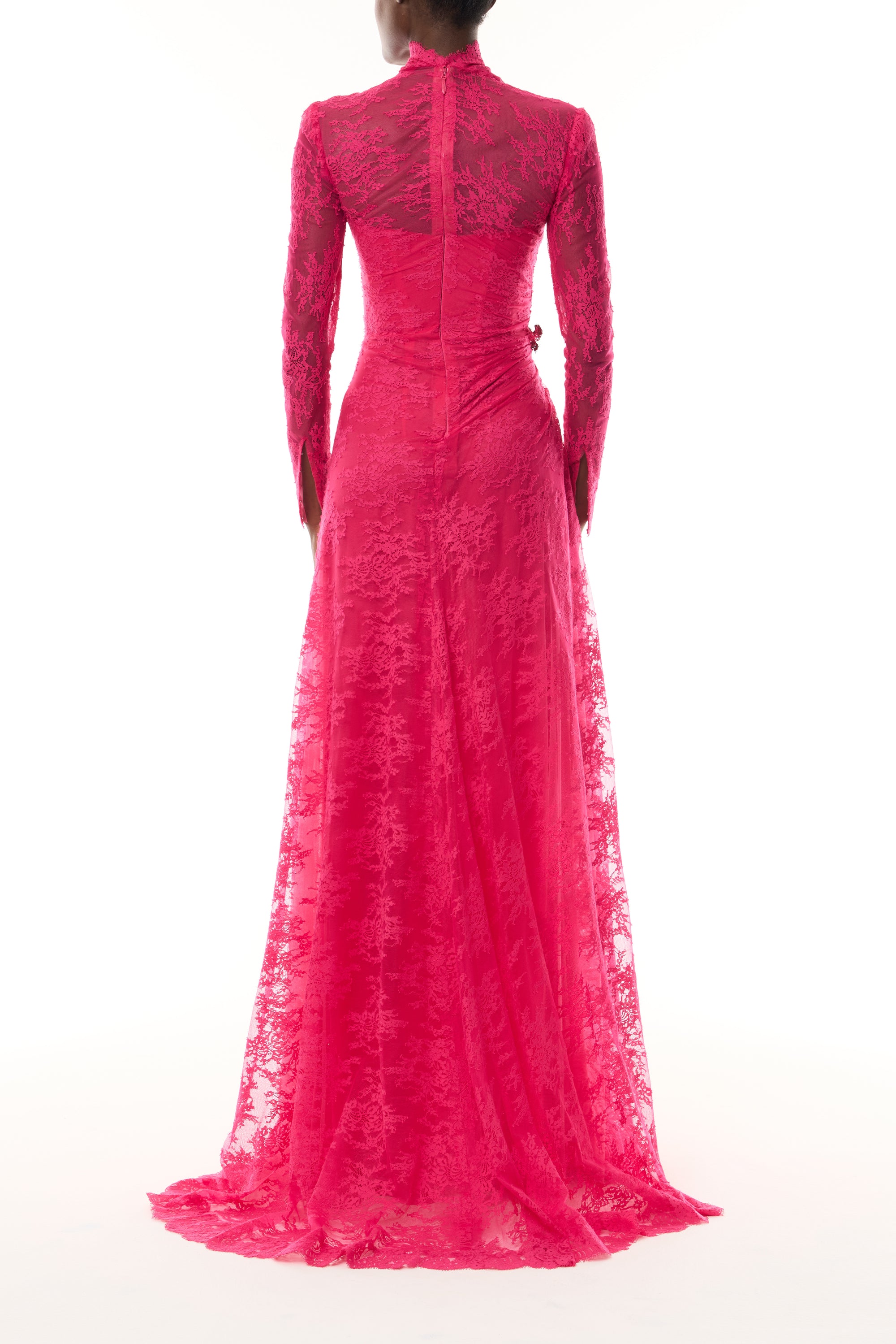 Monique Lhuillier Fall 2026 Pink Chantilly Lace high neck long sleeve gown with slit and silver floral embellishment - back.
