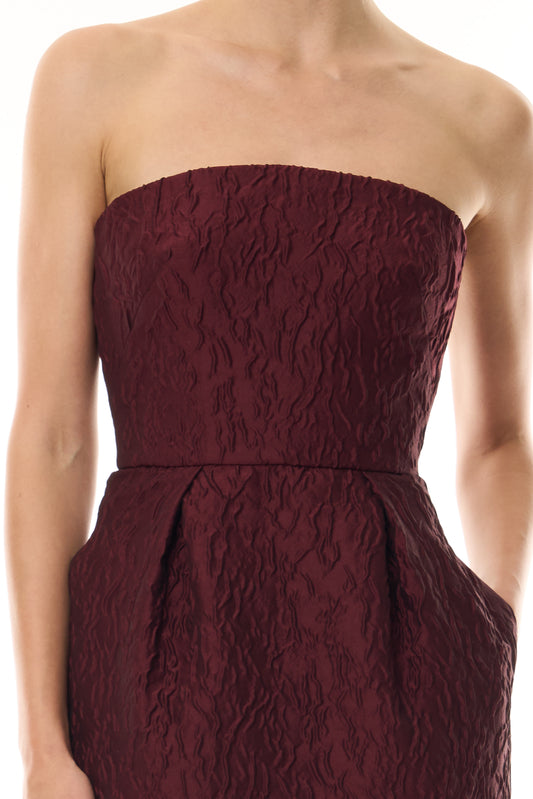 Monique Lhuillier Fall 2026 Rhubarb Jacquard strapless pleated cocktail dress with pockets - fabric.