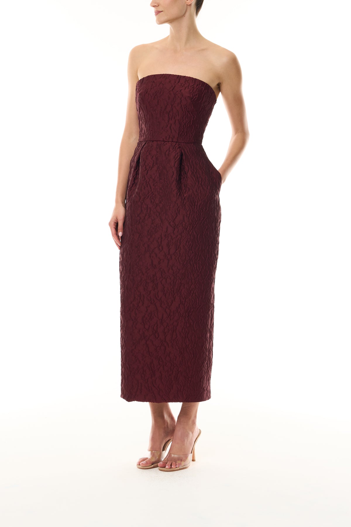 Monique Lhuillier Fall 2026 Rhubarb Jacquard strapless pleated cocktail dress with pockets - side.