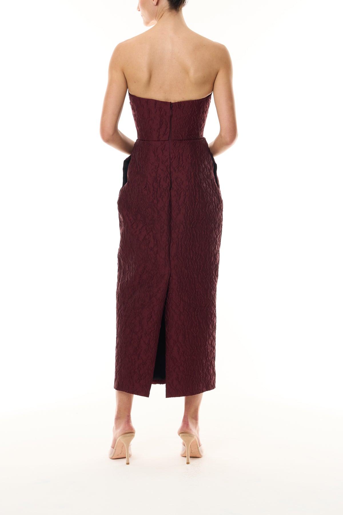 Monique Lhuillier Fall 2026 Rhubarb Jacquard strapless pleated cocktail dress with pockets - back.