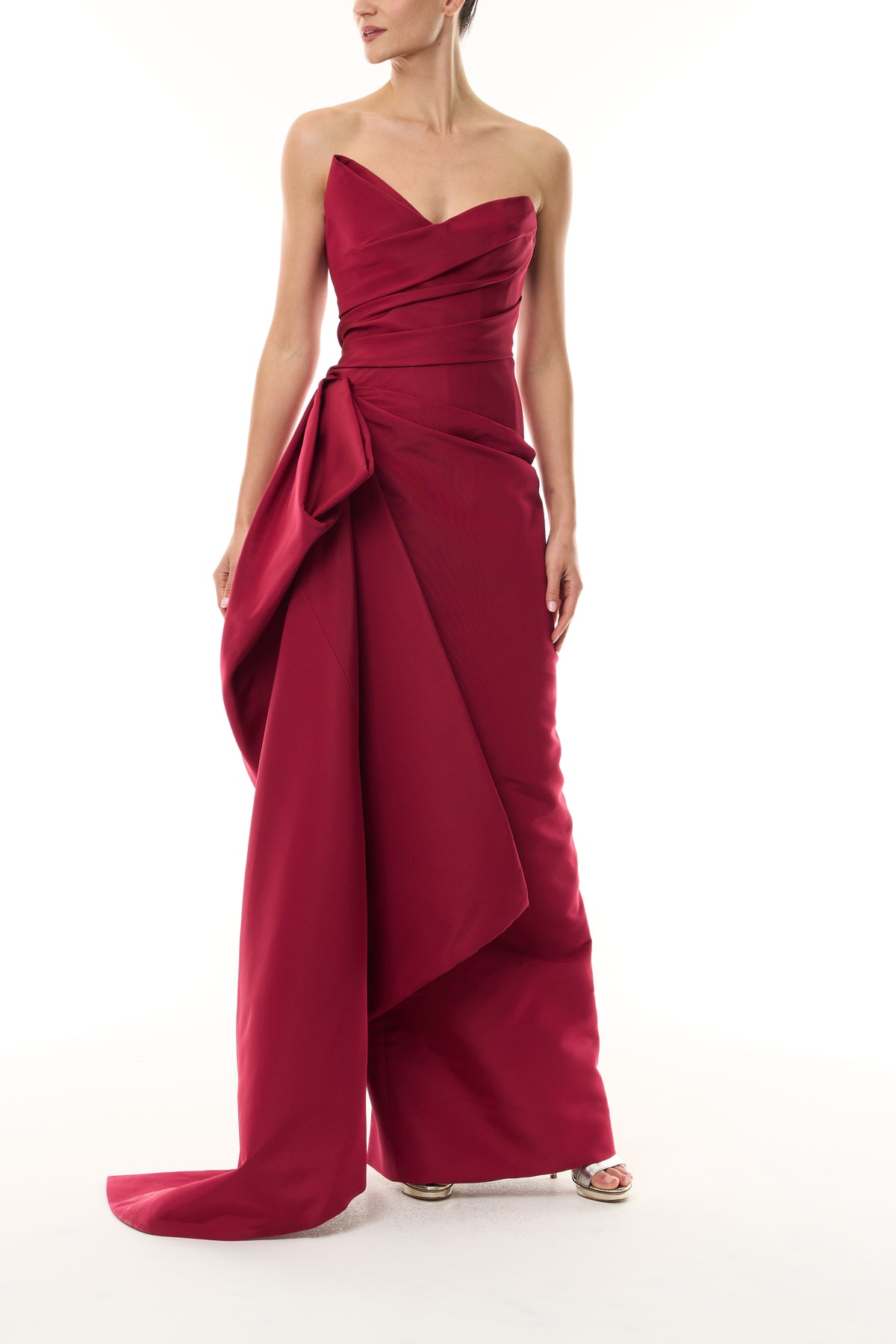Monique Lhuillier Fall 2026 silk faille red strapless asymmetric draped column gown with side train - front.