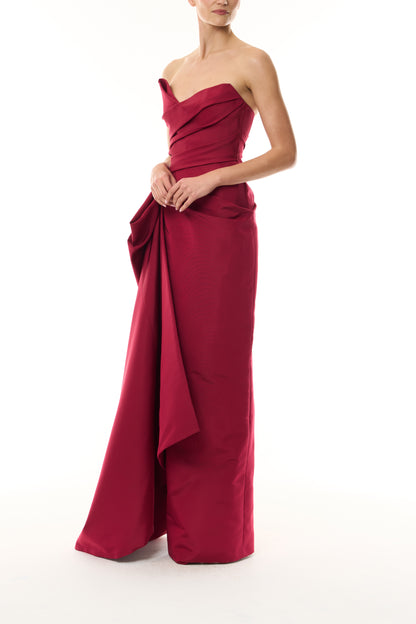 Monique Lhuillier Fall 2026 silk faille red strapless asymmetric draped column gown with side train - side.