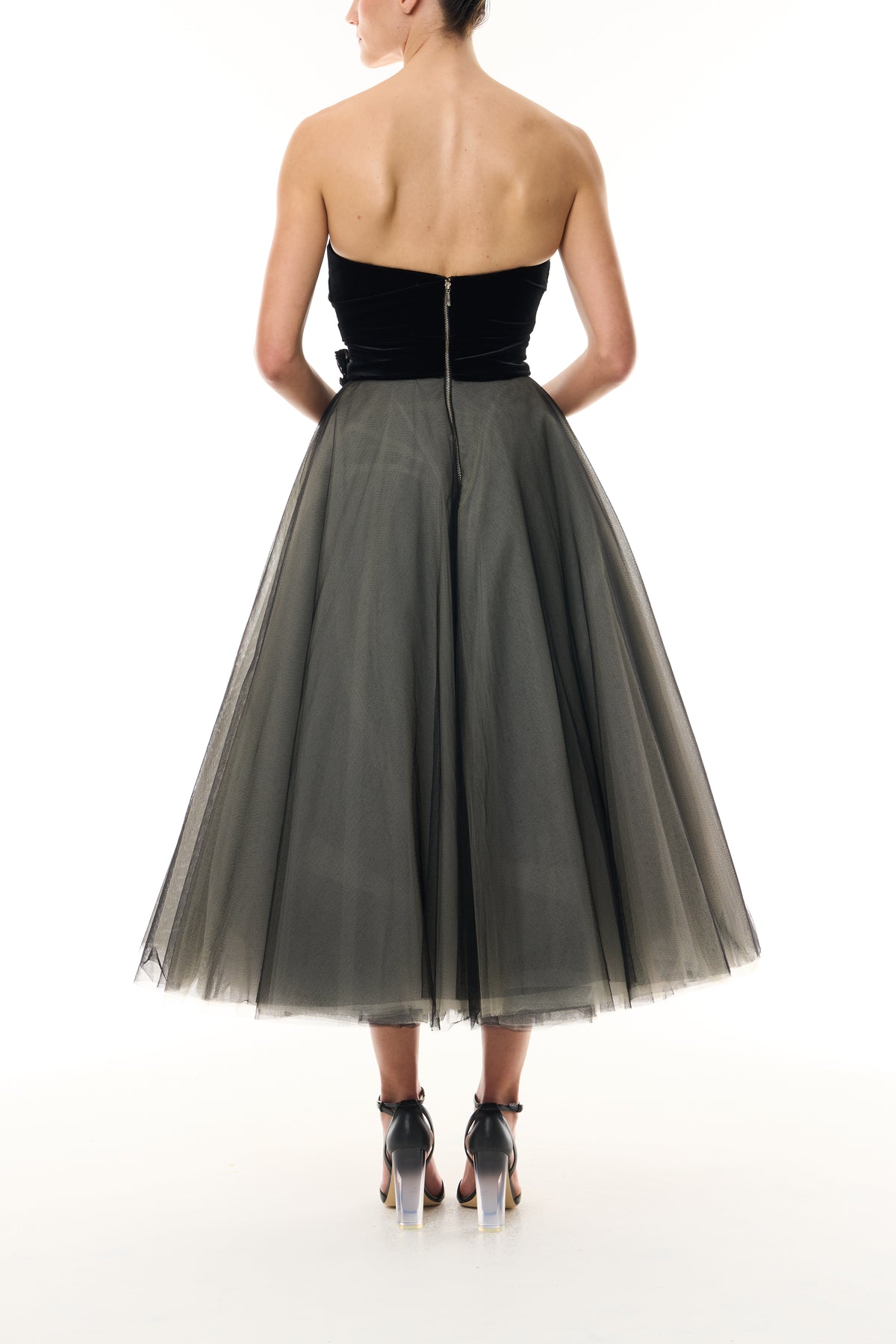 Monique Lhuillier Fall 2026 Noir / multi Stretch Velvet & Tulle strapless tea length dress with floral embellishment - back.