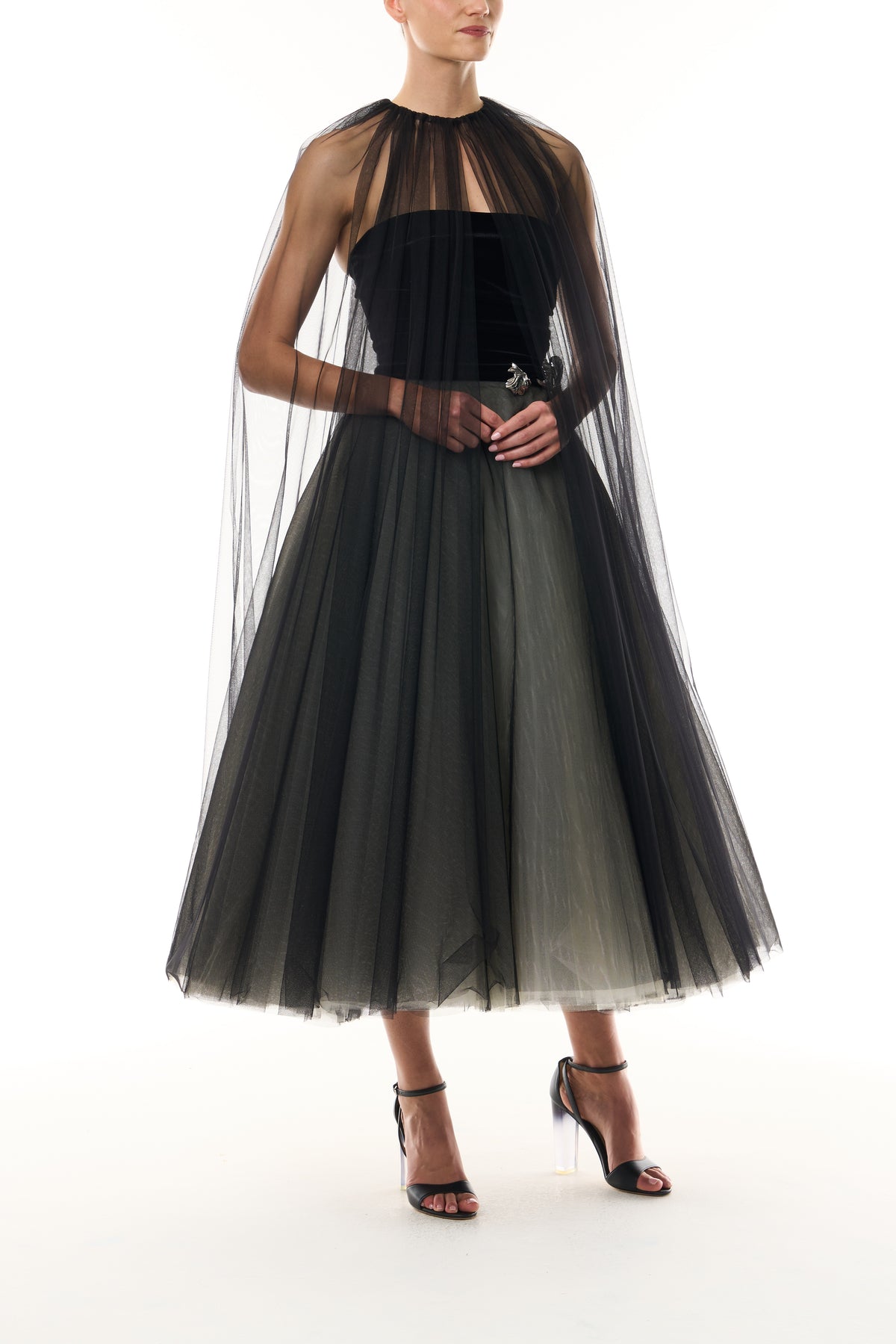 Monique Lhuillier Fall 2026 Noir / multi Stretch Velvet & Tulle strapless tea length dress with floral embellishment and coordinating noir tulle cape - front.