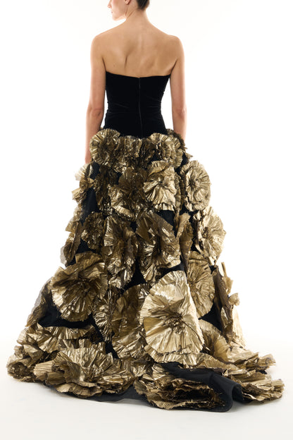 Monique Lhuillier Fall 2026 Noir/Gold velvet and embroidered lamé strapless dropped ballgown with three-dimensional floral skirt - back.