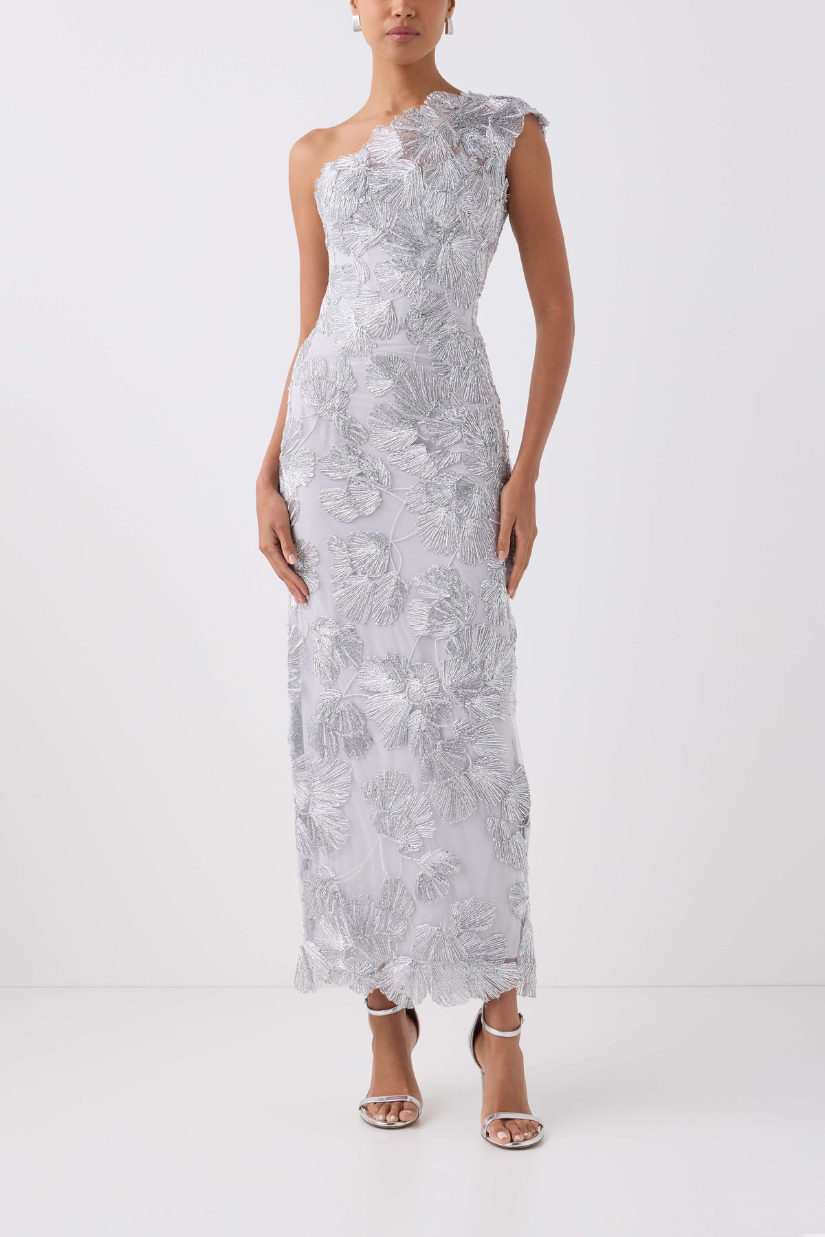 Monique Lhuillier Spring 2027 silver embroidered tulle one-shoulder tea length column gown - front.