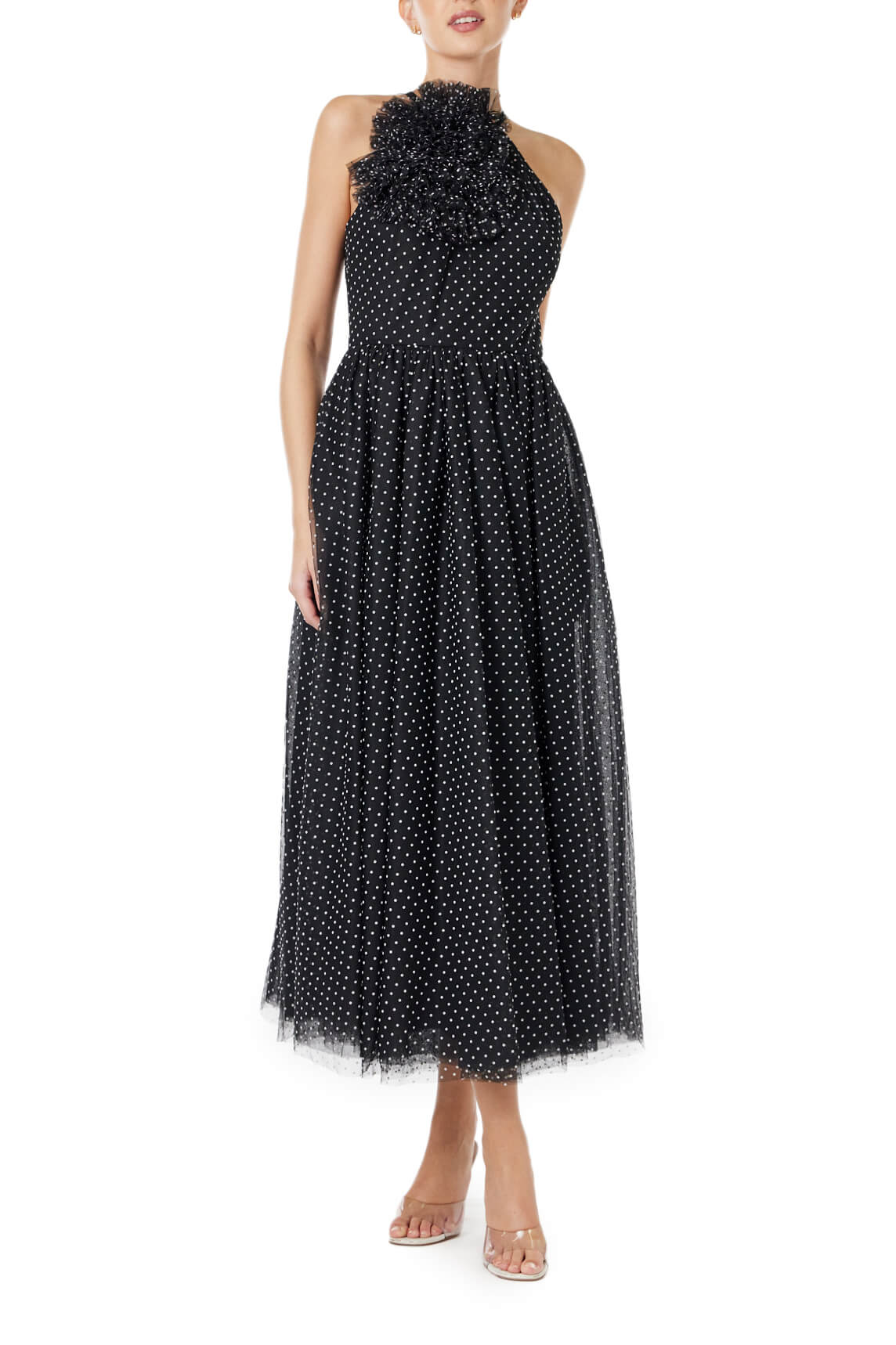 ML Monique Lhuillier midi length halter dress with puff accent at neckline in black and white dotted tulle fabric.