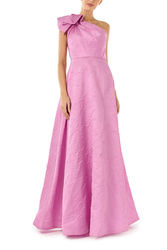 ML Monique Lhuillier floor length dress in orchid jacquard fabric with one shoulder and bow neckline.