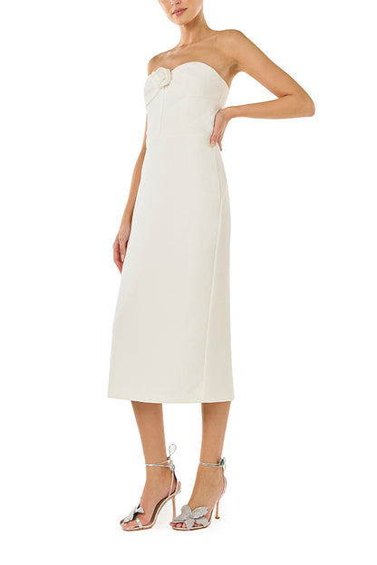 ML Monique Lhuillier Spring 2024 strapless ivory crepe midi dress with rosette detail at neckline - left side.