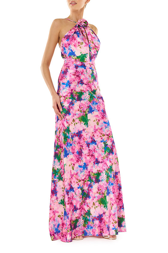 ML Monique Lhuillier Spring 2024 floor length dress with rosette, halter neckline and low V-back in Waterlily Floral crepe-back satin - side.