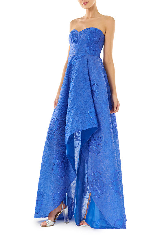 ML Monique Lhuillier Spring 2024 strapless gown with high-low hem in metallic royal blue - side two.