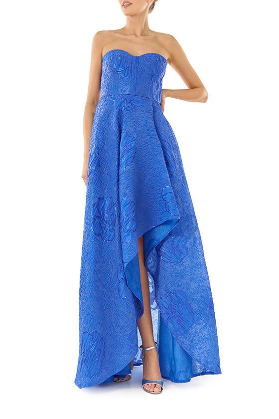 ML Monique Lhuillier Spring 2024 strapless gown with high-low hem in metallic royal blue - front three.