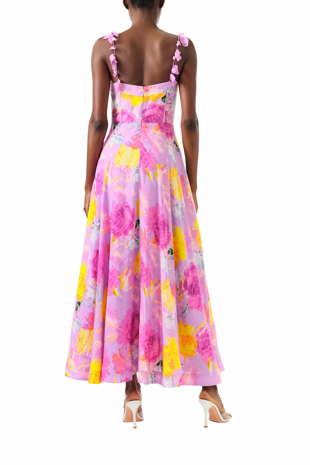 ML Monique Lhuillier 2024 Sleeveless midi dress with floral appliqued spaghetti straps and corset bodice in pink, purple and yellow floral printed linen - back.