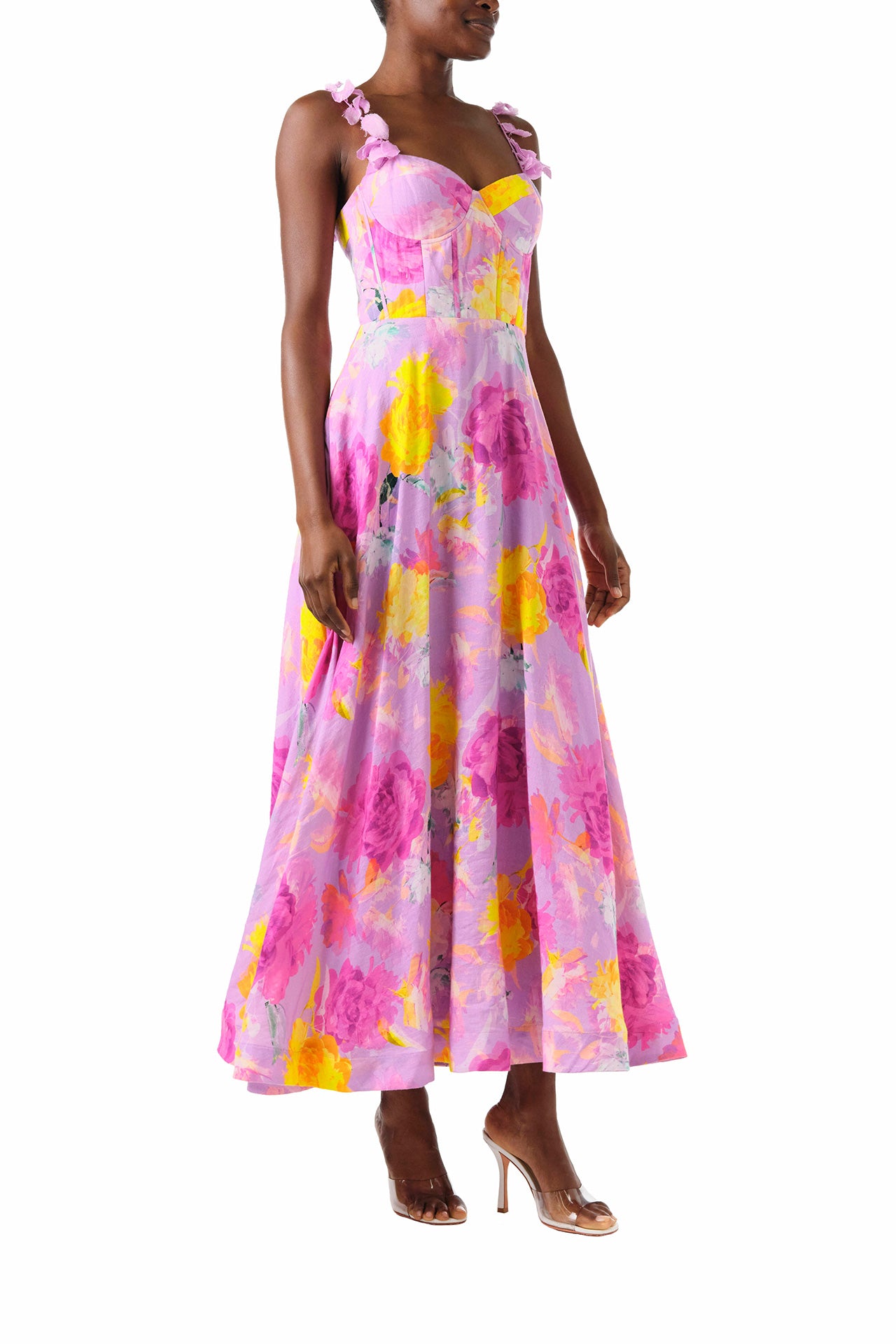 ML Monique Lhuillier 2024 Sleeveless midi dress with floral appliqued spaghetti straps and corset bodice in pink, purple and yellow floral printed linen - right side.