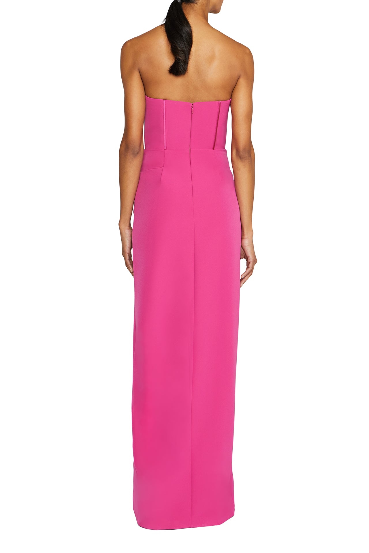 Strapless column gown with corseted bodice and rosette detail at front neckline in Cerise Pink crepe- back