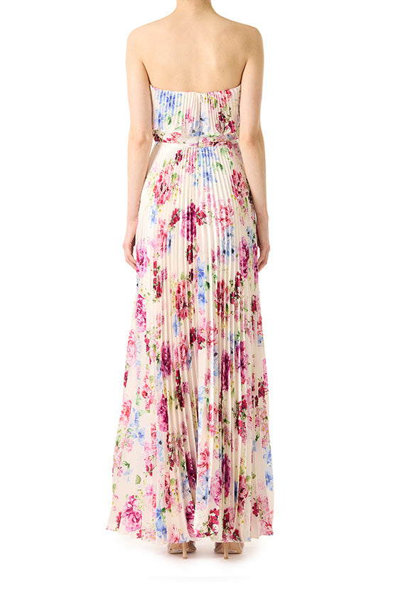 Strapless long dress in floral print satin with pleated skirt and ruffle neckline.