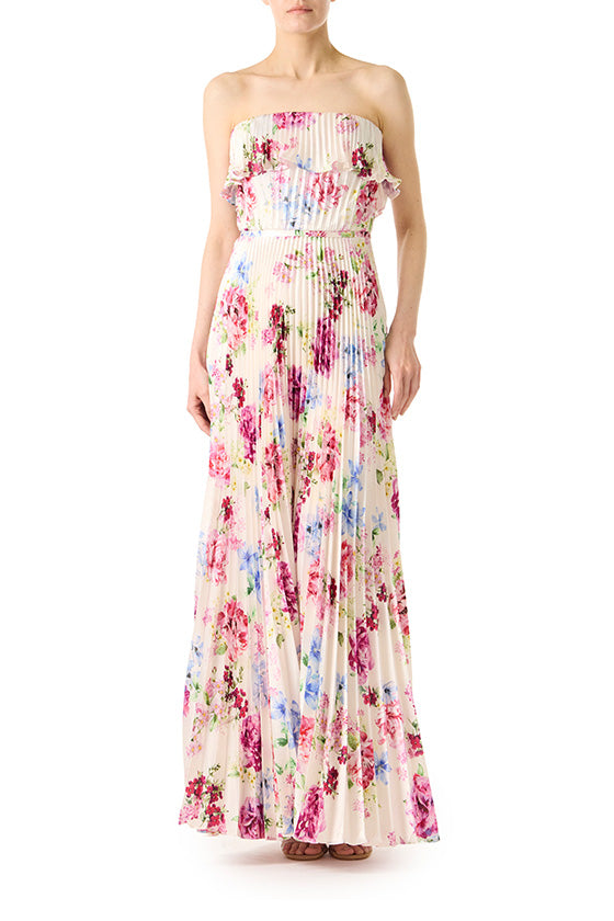 Strapless long dress in floral print satin with pleated skirt and ruffle neckline.