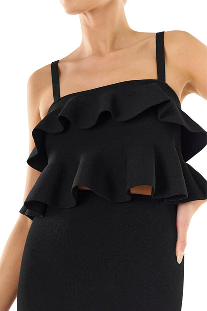 Monique Lhuillier black knit ruffle top with spaghetti straps and gold back zipper.