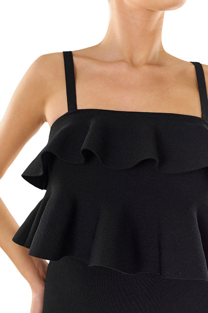 Monique Lhuillier black knit ruffle top with spaghetti straps and gold back zipper.