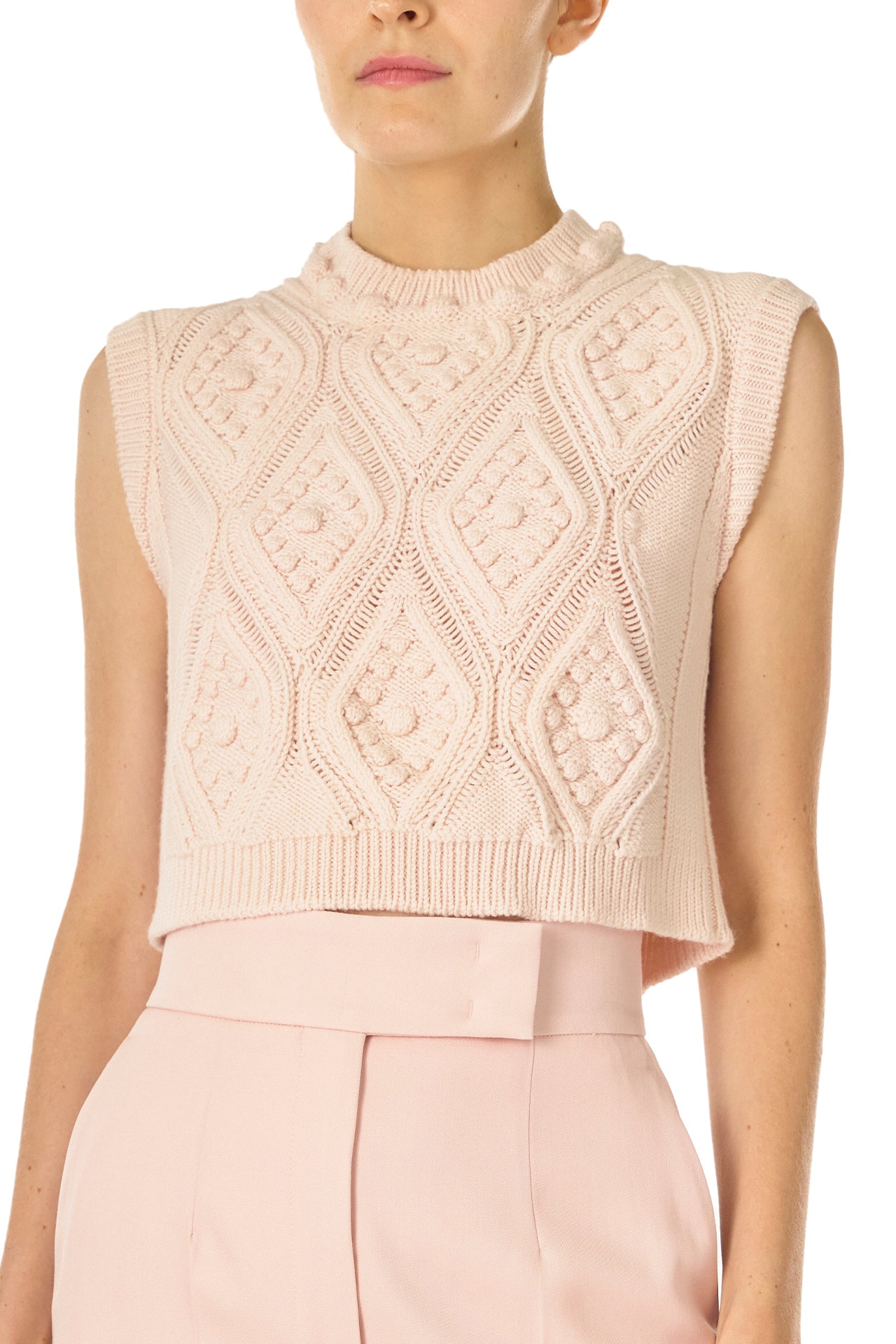 Monique Lhuillier Sleeveless, bobble crop tank in Pale Blush wool cable knit - front crop.