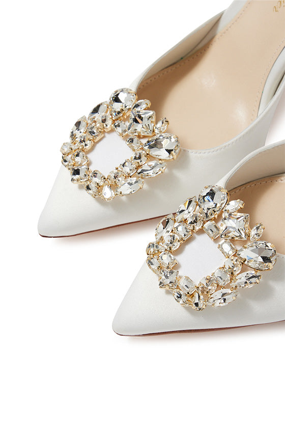 Monique Lhuillier silk white satin Carrie heel with pointed toe, rhinestone cluster and slingback. 