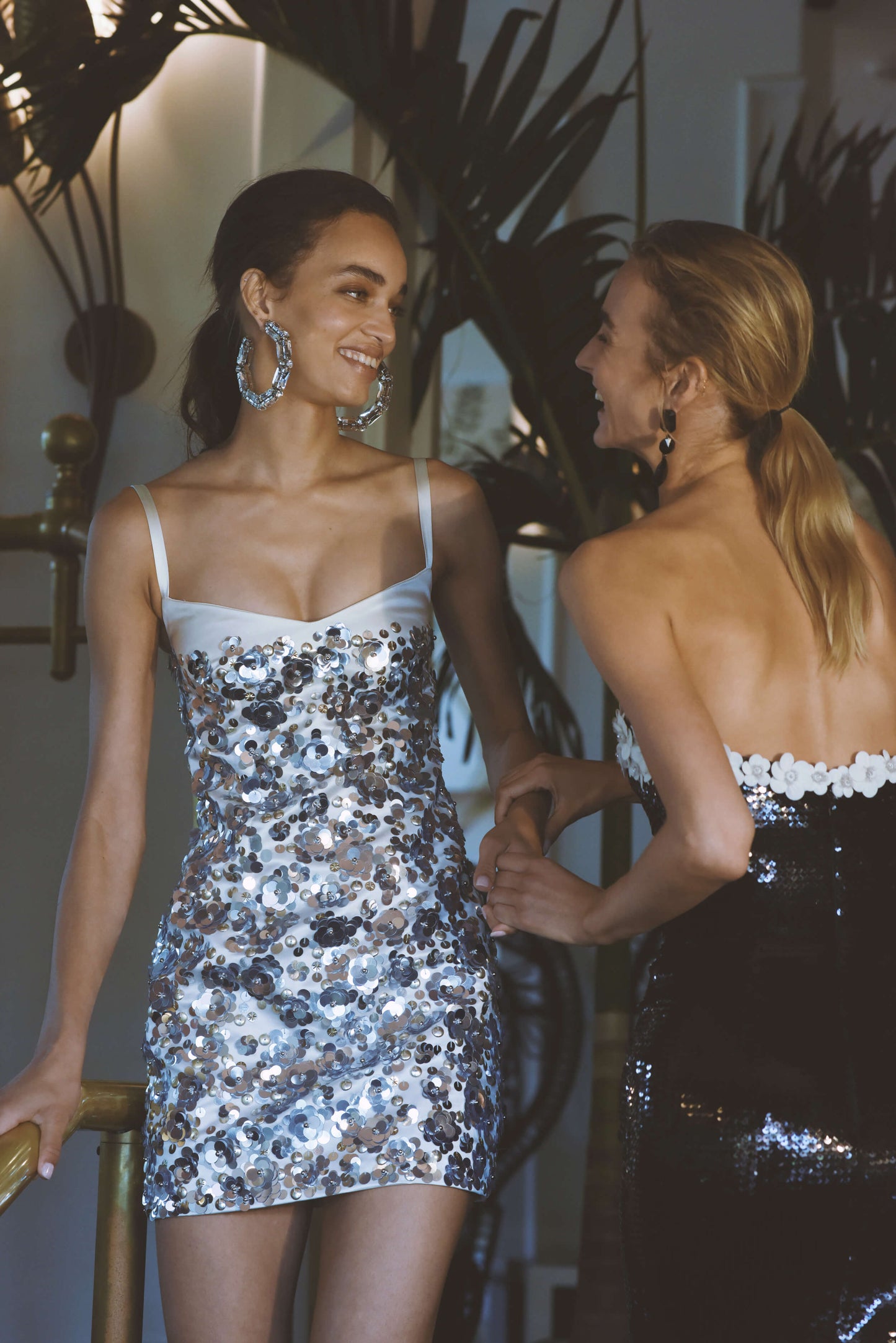 Monique Lhuillier Spring 2025 strapless column gown in noir sequins with silk white floral embroidered neckline - lookbook three.