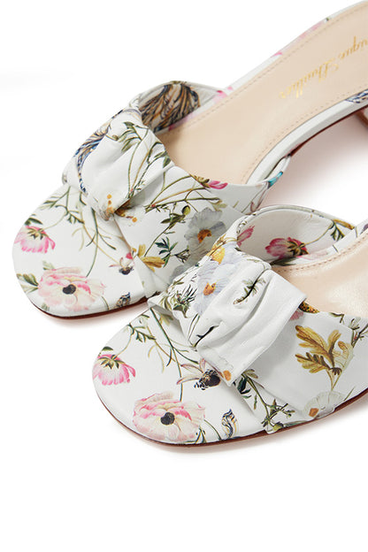 Monique Lhuillier low block heel mule in white botanical printed leather.