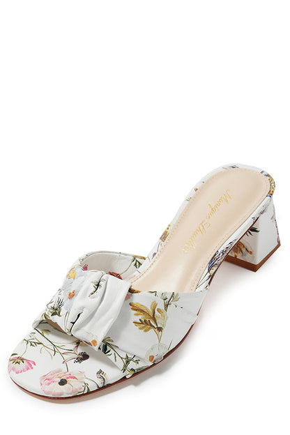 Monique Lhuillier low block heel mule in white botanical printed leather.