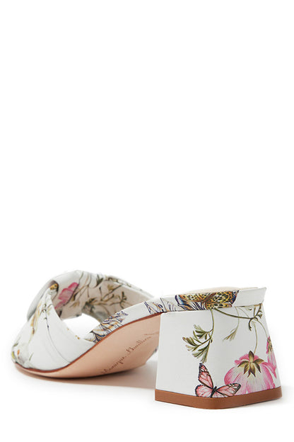 Monique Lhuillier low block heel mule in white botanical printed leather.