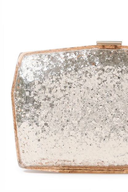 Lucite faceted minaudière with gold metal clasp at top in Champagne confetti glitter- detail