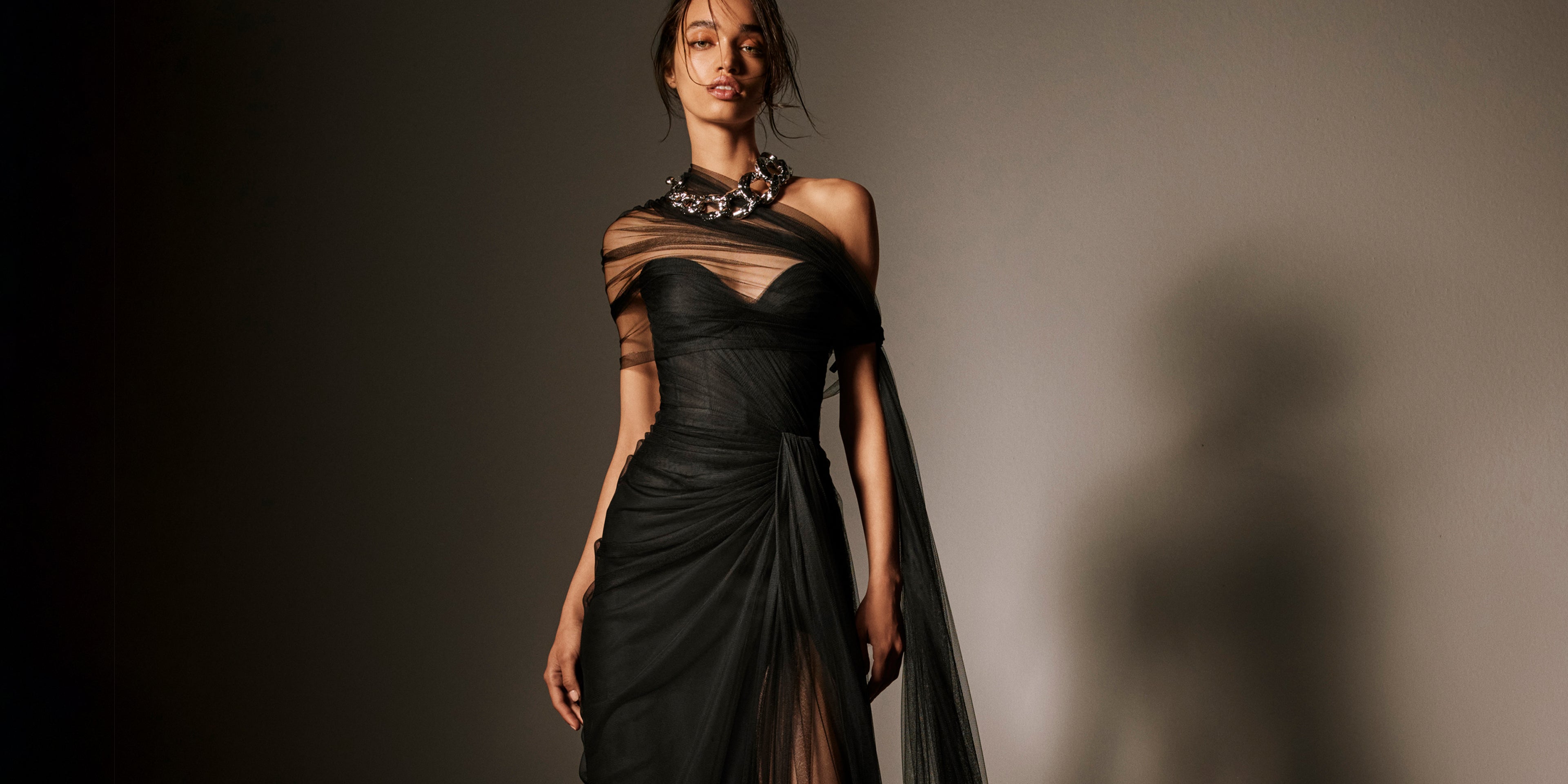 Monique Lhuillier Spring 2026 Strapless draped gown with detachable wrap
and streamers in Noir Spanish tulle - lookbook.
