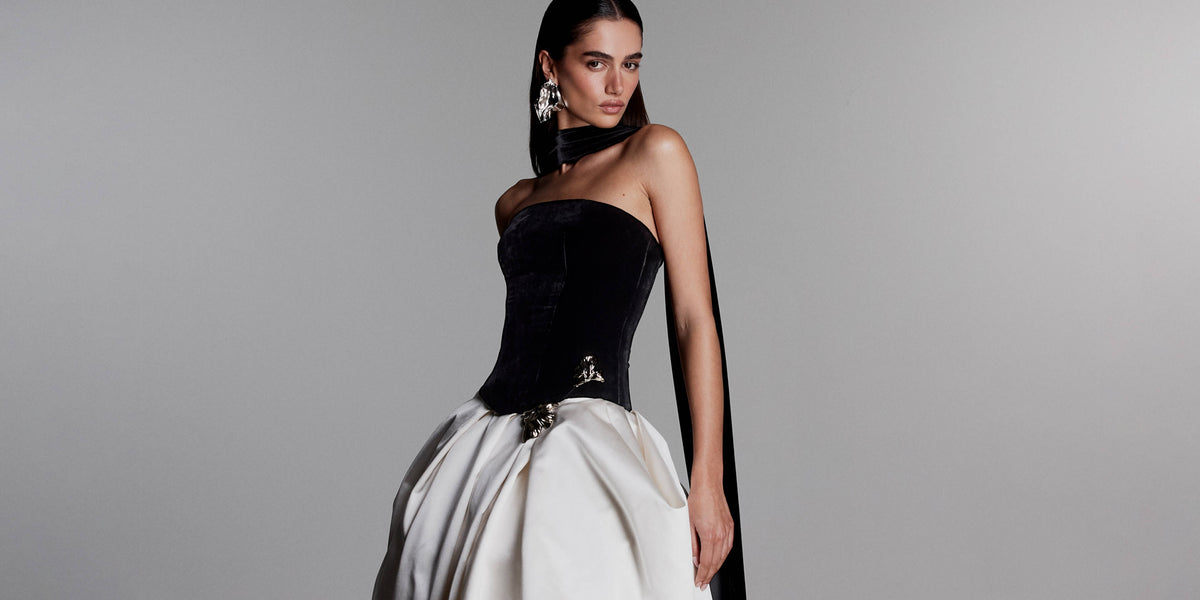 Monique Lhuillier Fall 2026 Noir and Silk White Satin and Velvet ball gown with silver floral embellishment and neck scarf -  lookbook.