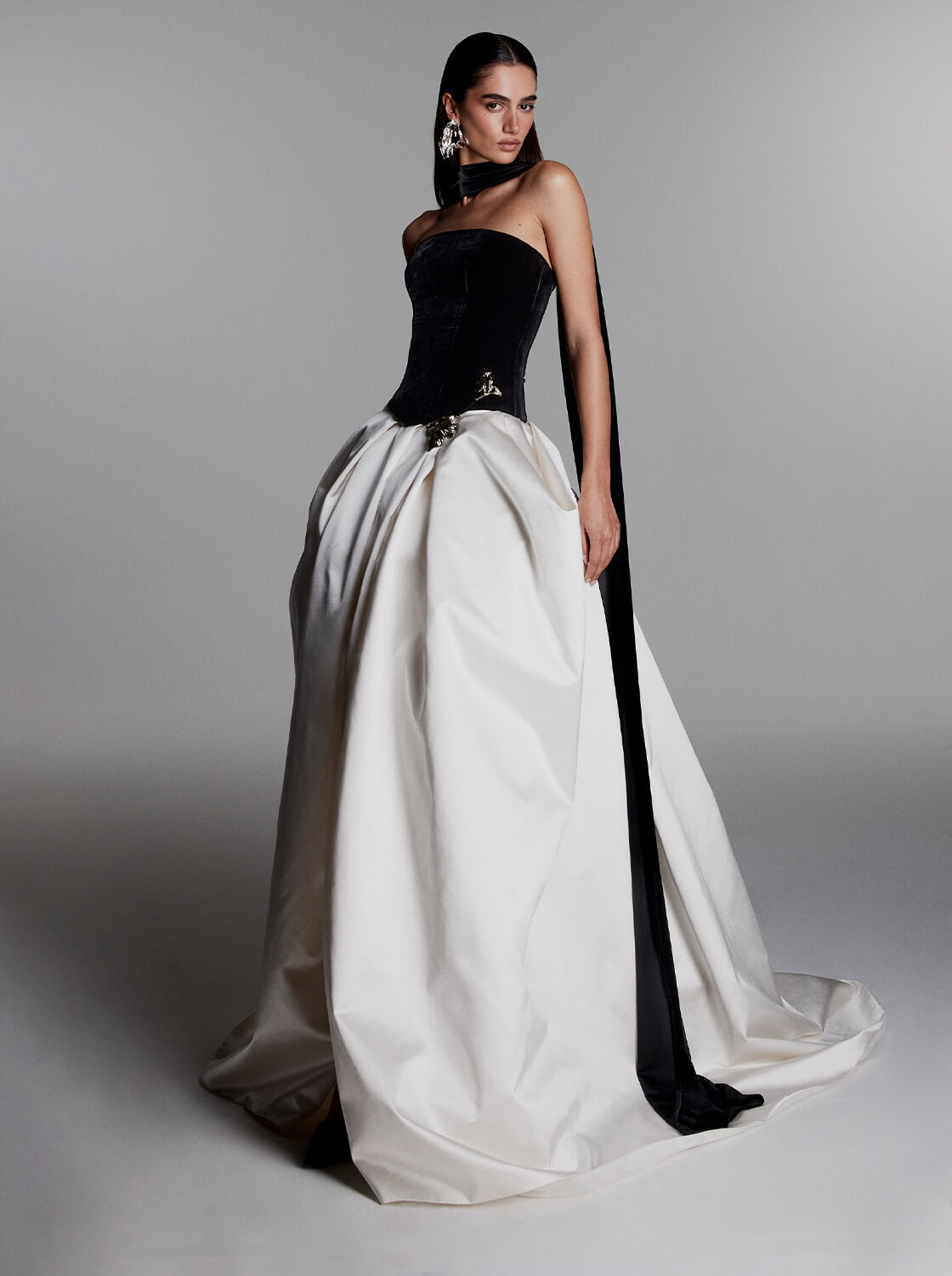 Monique Lhuillier Fall 2026 Noir and Silk White Satin and Velvet ball gown with silver floral embellishment and neck scarf -  lookbook.
