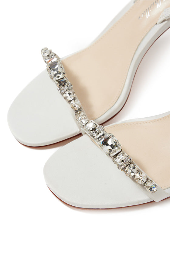 Monique Lhuillier Hollis heel in silk white satin with rhinestone toe strap and block heel.