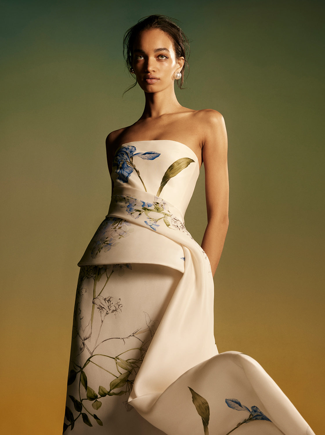 Monique Lhuillier Spring 2026 Iris Bouquet
Printed Gazar Strapless draped peplum gown - lookbook.