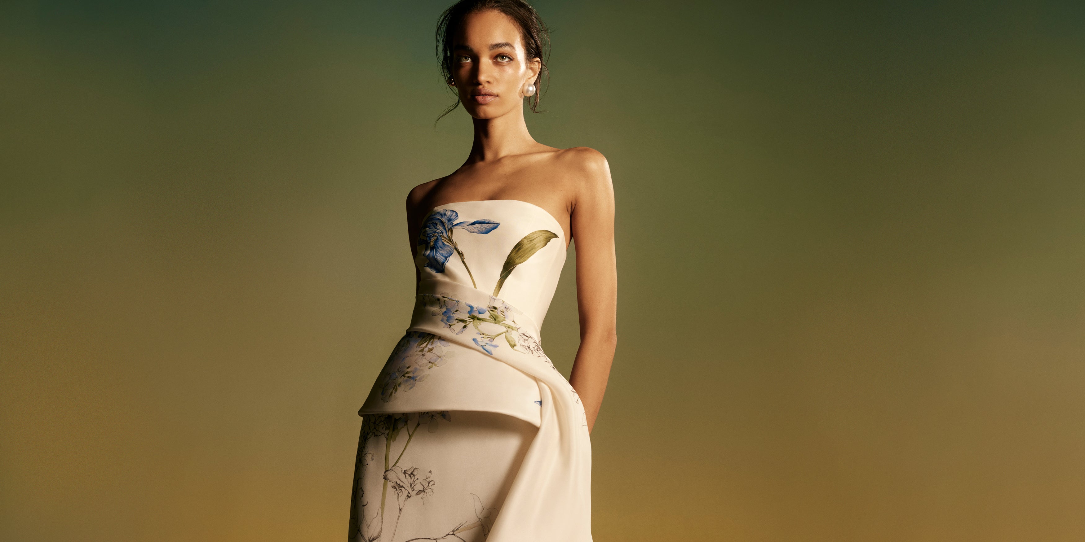 Monique Lhuillier Spring 2026 Iris Bouquet
Printed Gazar Strapless draped peplum gown - lookbook.